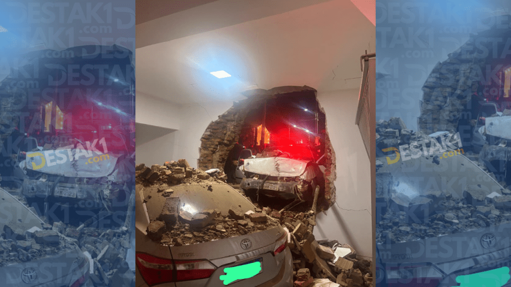 Carro desgovernado desce ladeira da Serra da Raiz, invade garagem e deixa duas pessoas presas às ferragens em Duas&nbsp;Estradas